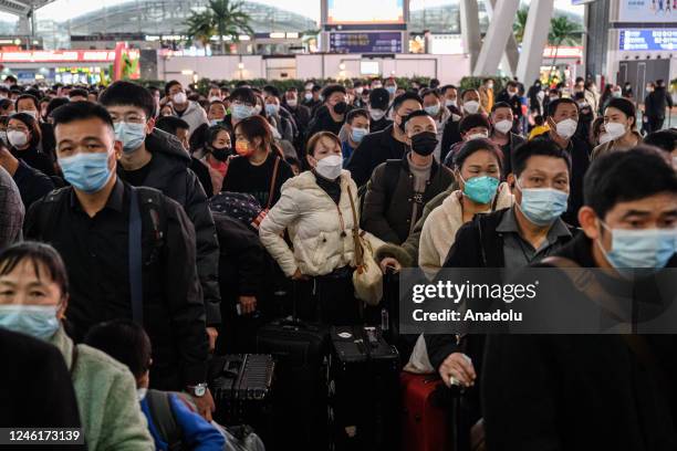 Crowd of passengers is seen at Guangzhou South Railway Station as they prepare to travel to their hometowns for the 'Spring Festival' or Lunar New...