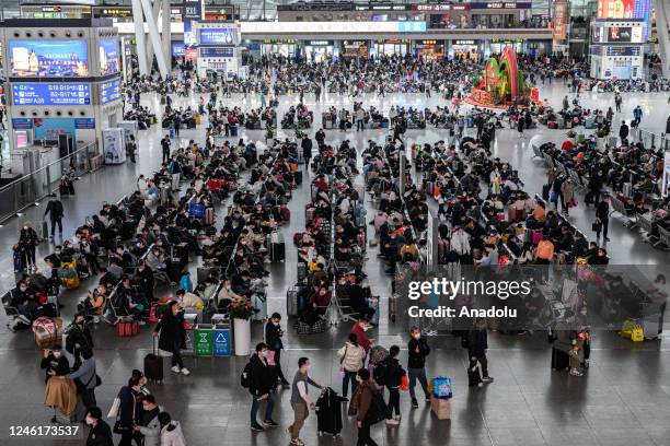 Crowd of passengers is seen at Guangzhou South Railway Station as they prepare to travel to their hometowns for the 'Spring Festival' or Lunar New...