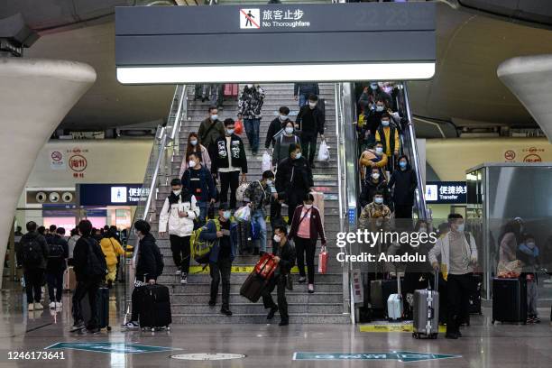 Crowd of passengers is seen at Guangzhou South Railway Station as they prepare to travel to their hometowns for the 'Spring Festival' or Lunar New...