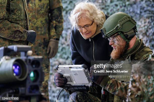 German Defense Minister Christine Lambrecht is seen during the unit's demonstration of the capabilities of the Marder infantry fighting vehicle of...