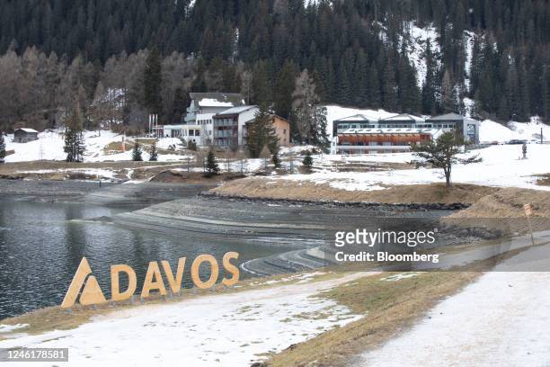Wooden sign on the waterfront of Lake Davos in Davos, Switzerland, on Sunday, Jan. 8, 2023. Though its perched at an altitude of 1,560 meters, this...