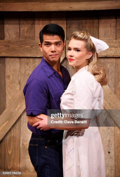 Telly Leung and Megan Gardiner pose at a photocall for "George Takeis Allegiance", a new musical inspired by George Takei's own WW2 experience in a...
