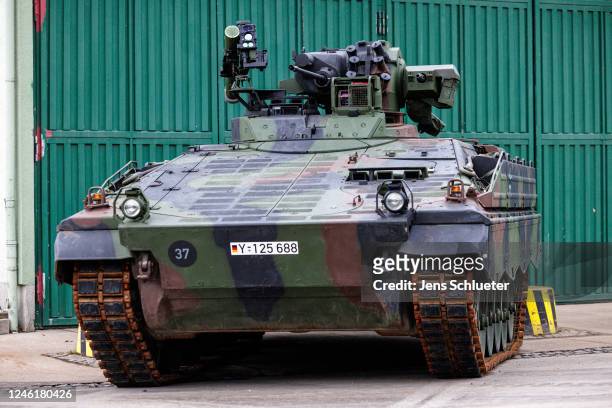 Soldiers of the Bundeswehr's Panzergrenadierbrigade 37 mechanized infantry unit demonstrate the capabilities of the Marder infantry fighting vehicle...