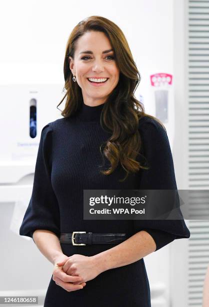 Catherine, Princess of Wales smiles as she and Prince William, Prince of Wales visit the Royal Liverpool University Hospital on January 12, 2023 in...