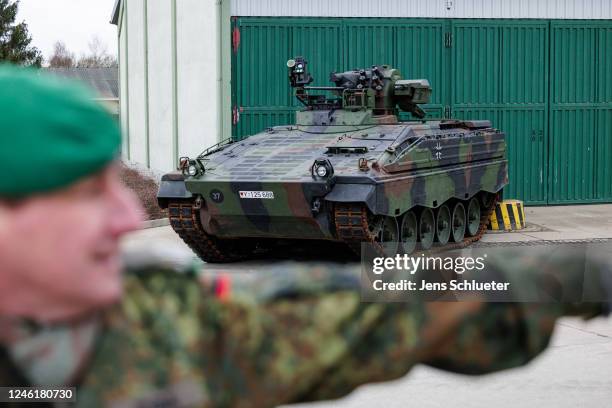 Soldiers of the Bundeswehr's Panzergrenadierbrigade 37 mechanized infantry unit demonstrate the capabilities of the Marder infantry fighting vehicle...