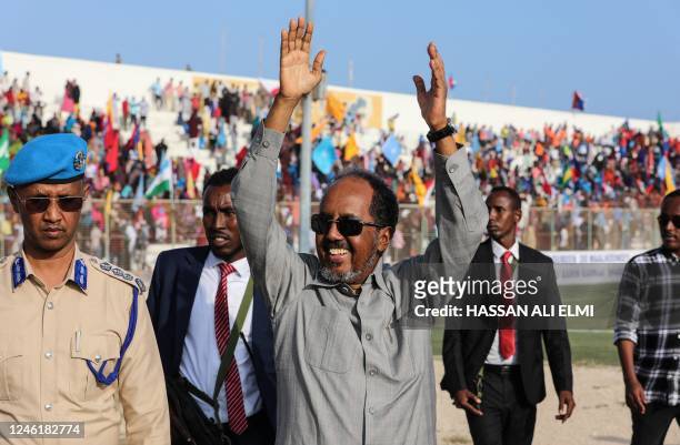 Somalia's President Hassan Sheikh Mohamud gestures as he attends a rally against the Al-Shabaab jihadist group in Mogadishu on January 12, 2023. -...