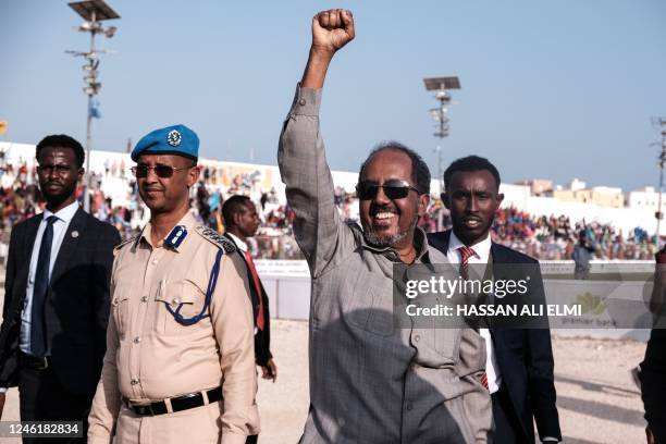 Somalia's President Hassan Sheikh Mohamud gestures as he attends a rally against the Al-Shabaab jihadist group in Mogadishu on January 12, 2023. -...