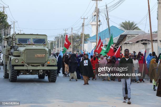 Demonstrators attend a rally against the Al-Shabaab jihadist group in Mogadishu on January 12, 2023. - Somalia's President Hassan Sheikh Mohamud has...