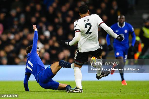 Joao Felix of Chelsea receives a red card for this challenge on Kenny Tete of Fulham FC during the Premier League match between Fulham FC and Chelsea...