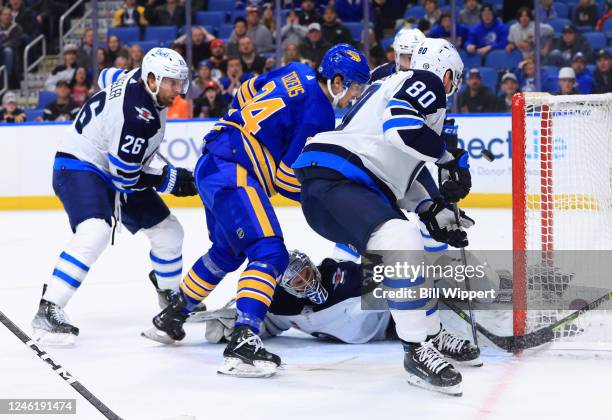 Connor Hellebuyck of the Winnipeg Jets defends the net during an NHL game against the Buffalo Sabres on January 12, 2023 at KeyBank Center in...