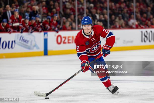 Cole Caufield of the Montreal Canadiens skates with the puck during the third period of the NHL regular season game between the Montreal Canadiens...