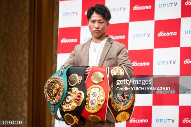 Boxer Naoya Inoue poses for photographs during a press conference in Yokohama on January 13, 2023.