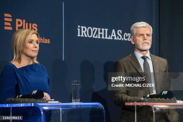 Presidential candidate Danuse Nerudova looks on next to Presidential candidate and former Chief of the General Staff of the Czech Army Petr Pavel...