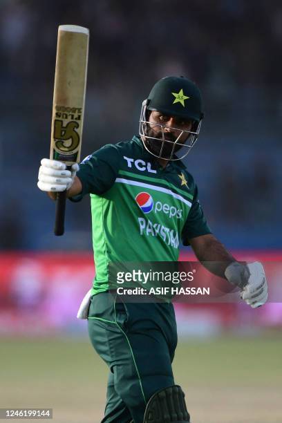 Pakistan's Fakhar Zaman celebrates after scoring a century during the third and final one-day international cricket match between Pakistan and New...
