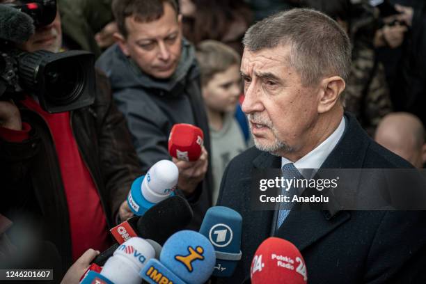 Presidential candidate Andrej Babis speaks to the press members in outside the polling station after voting during in the presidential elections in...