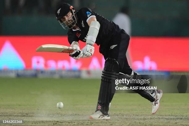 New Zealand's captain Kane Williamson plays a shot during the third and final one-day international cricket match between Pakistan and New Zealand at...