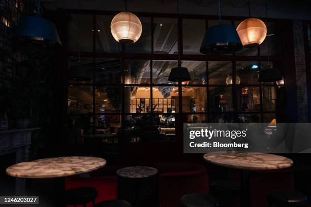 Empty tables outside a restaurant in the Soho district of London, UK, on Thursday, Jan. 12, 2023. Britain's pubs and restaurants are cutting their...