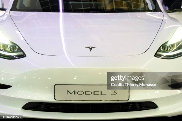 The Tesla Logo is seen on a Model 3 during the press opening of the 100th edition of the Brussels Motor Show, in the Heysel Park, on Friday January...