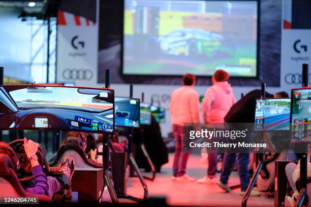 Visitors enjoy the E-Gaming zone during the press opening of the 100th edition of the Brussels Motor Show, in the Heysel Park, on Friday January 13...