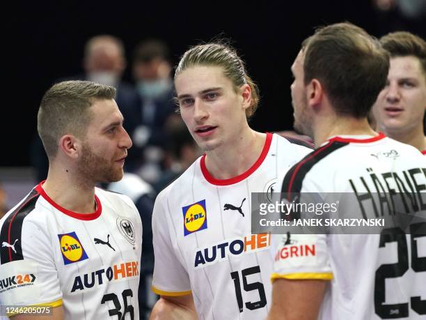 Germany's wing Lukas Mertens, Germany's centre back Juri Knorr and Germany's right back Kai Hafner talk during the Men's IHF World Handball...