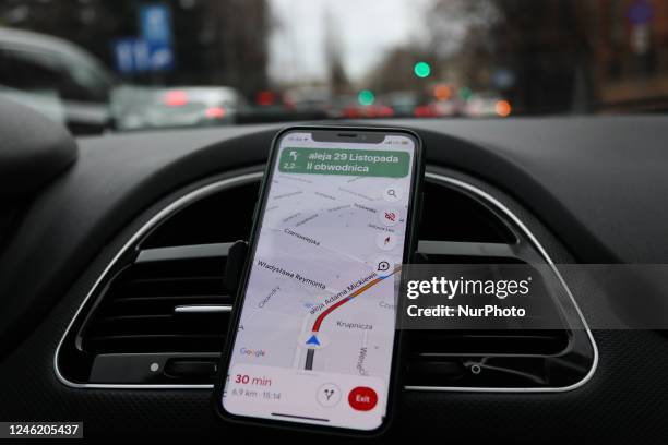 Google Maps app is seen displayed on a phone screen in this illustration photo taken in a car in Krakow, Poland on January 13, 2023.