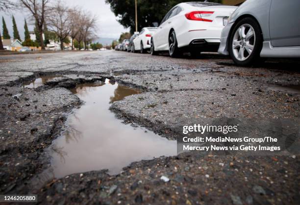 Potholes on Phelan Avenue in San Jose, Calif., on Tuesday, Jan. 10, 2023. The potholes were temporarily fixed by City of San Jose Department of...