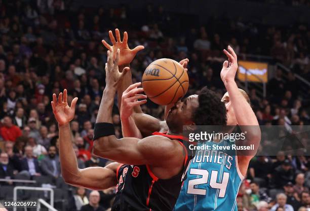 Toronto Raptors forward O.G. Anunoby tries to haul in a rebound as the Toronto Raptors beat the Charlotte Hornets 124-114 at Scotiabank Arena in...