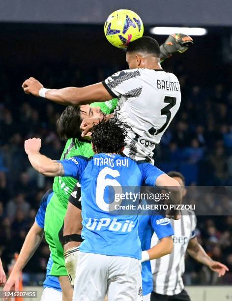 Juventus' Brazilian defender Bremer vies with Napoli's Italian goalkeeper Alex Meret during the Italian Serie A football match between Napoli and...