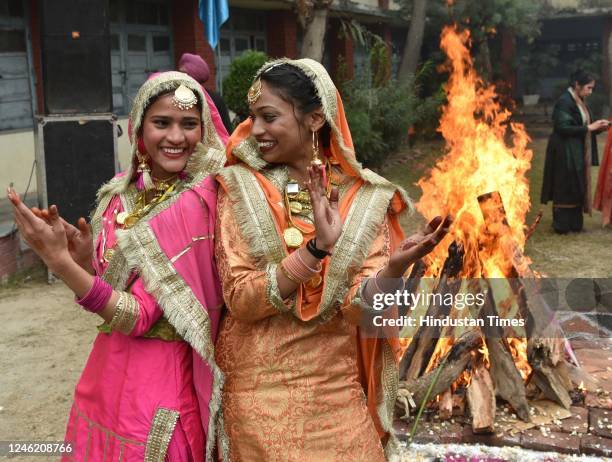 Students perform Gidha during celebration Lohri festival at Shahzada Nand College on January 13, 2023 in Amritsar, India. Lohri is a popular harvest...