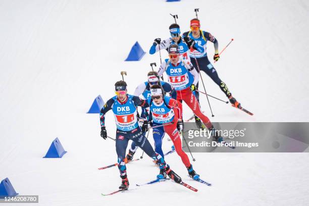Sturla Holm Laegreid of Norway, Eric Perrot of France, Tuomas Harjula of Finland in action competes during the Men 4x7.5 km Relay at the BMW IBU...
