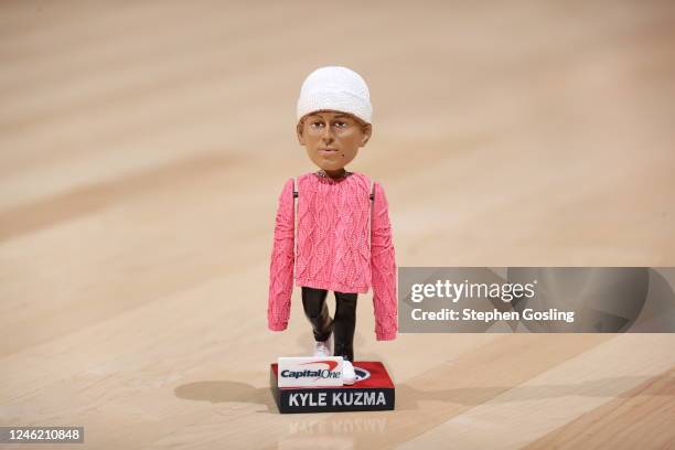 Promotional Kyle Kuzma Pink Sweater Bobblehead courtesy of Capital One on January 13, 2023 at Capital One Arena in Washington, DC. NOTE TO USER: User...