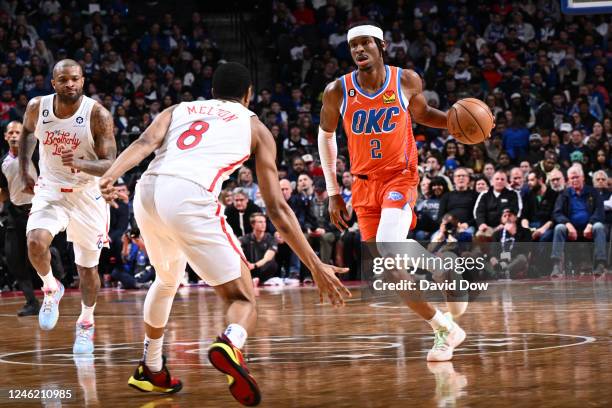 Shai Gilgeous-Alexander of the Oklahoma City Thunder dribbles the ball during the game against the Philadelphia 76ers on January 12, 2023 at the...