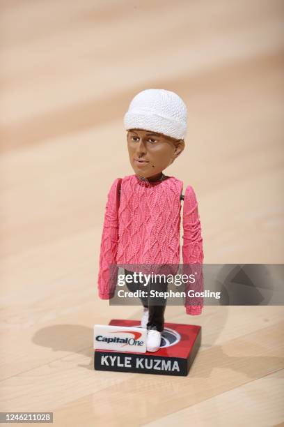 Promotional Kyle Kuzma Pink Sweater Bobblehead courtesy of Capital One on January 13, 2023 at Capital One Arena in Washington, DC. NOTE TO USER: User...