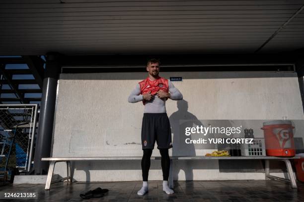 French goalkeeper Jeremy Vachoux, recently signed by the Carabobo Futbol Club team, prepares before a training session at the Empresas Polar sports...