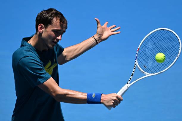 Russia's Daniil Medvedev hits a return during a practice session ahead of the Australian Open tennis tournament in Melbourne on January 14, 2023. -...