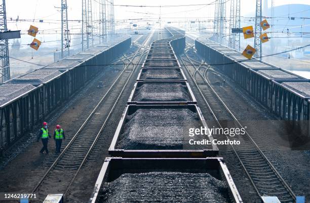 Coal trains wait to be transported at the State Energy Group Shendong Coal Burtai Coal mine in Ejin Horo Banner, Inner Mongolia, China, January 14,...