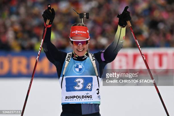 Germany's Denise Herrman-Wick reacts in the finish area of of the women's 4 x 6km relay event of the IBU Biathlon World Cup in Ruhpolding, southern...