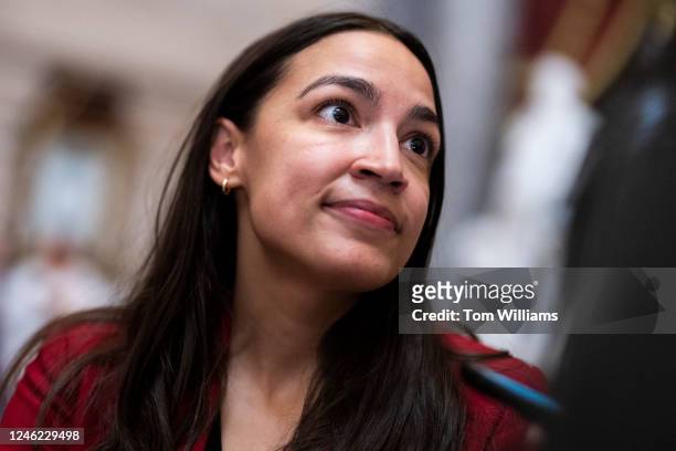 Rep. Alexandria Ocasio-Cortez, D-N.Y., talks with reporters in the U.S. Capitols Statuary Hall on Thursday, January 12, 2023.