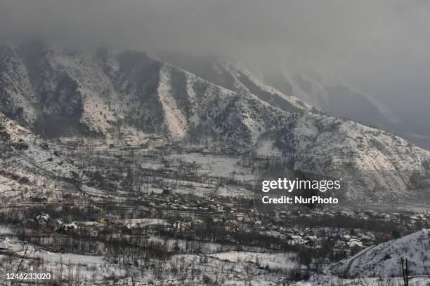 View of snow-covered hills after the fresh spell of snowfall on the outskirts of Srinagar, Indian Administered Kashmir on 14 January 2023. Two...