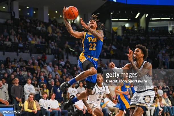 Pittsburgh guard Nike Sibande drives to the basket during the college basketball game between the Pittsburgh Panthers and the Georgia Tech Yellow...