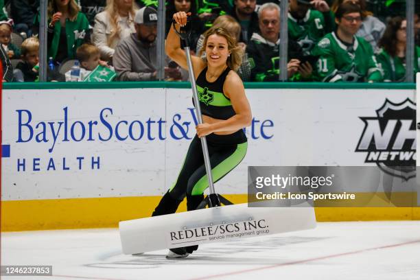 The Dallas Stars Ice Girls clear the ice during the game between the Dallas Stars and the Calgary Flames on January 14, 2023 at American Airlines...