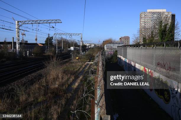 Photograph taken on January 11, 2023 shows a pass-way and rail tracks near the proposed construction land for "Camden High line" project in Camden,...