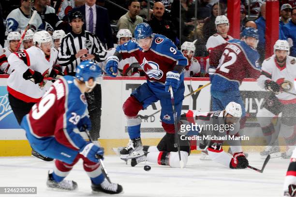 Evan Rodrigues of the Colorado Avalanche skates against Mark Kastelic of the Ottawa Senators at Ball Arena on January 14, 2023 in Denver, Colorado.