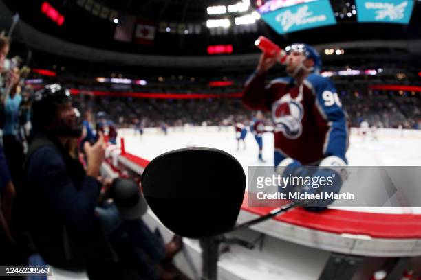 Mikko Rantanen of the Colorado Avalanche drinks from a water bottle prior to the game against the Ottawa Senators at Ball Arena on January 14, 2023...