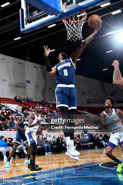 Jay Scrubb of the Lakeland Magic takes the ball to the basket against the Greensboro Swarm during the game on January 14, 2023 at RP Funding Center...