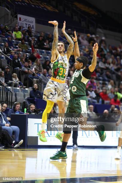 Fort Wayne, IN Gabe York of the Fort Wayne Mad Ants shoots a three point basket against Rob Edwards of the Wisconsin Herd at Allen County War...