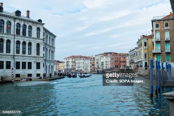 Boats and traditional Gondolas are seen at the "Canal Grande". After the pandemic years, tourists have begun to throng the streets of Venice once...