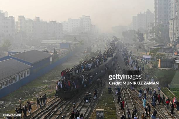 Muslim devotees arrive in an overcrowded train to take part in the Akheri Munajat or final prayers during 'Biswa Ijtema', an annual congregation of...