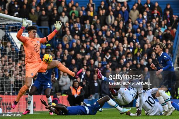 Chelsea's Spanish goalkeeper Kepa Arrizabalaga saves an attempt from Crystal Palace's English defender Tyrick Mitchell during the English Premier...