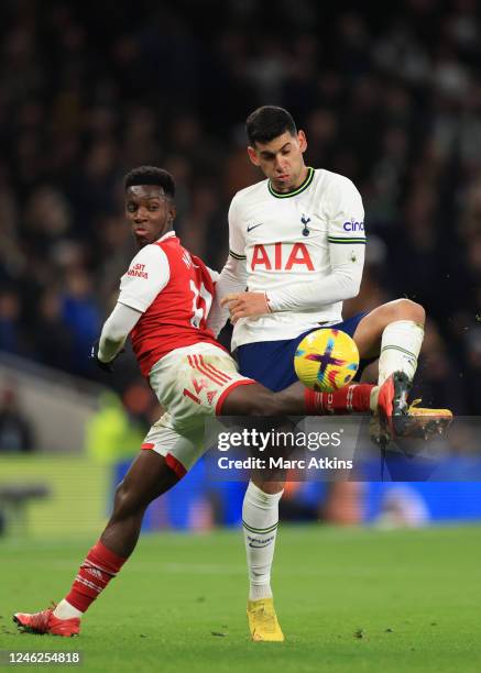 Eddie Nketiah of Arsenal in action with Cristian Romero of Tottenham Hotspur during the Premier League match between Tottenham Hotspur and Arsenal FC...